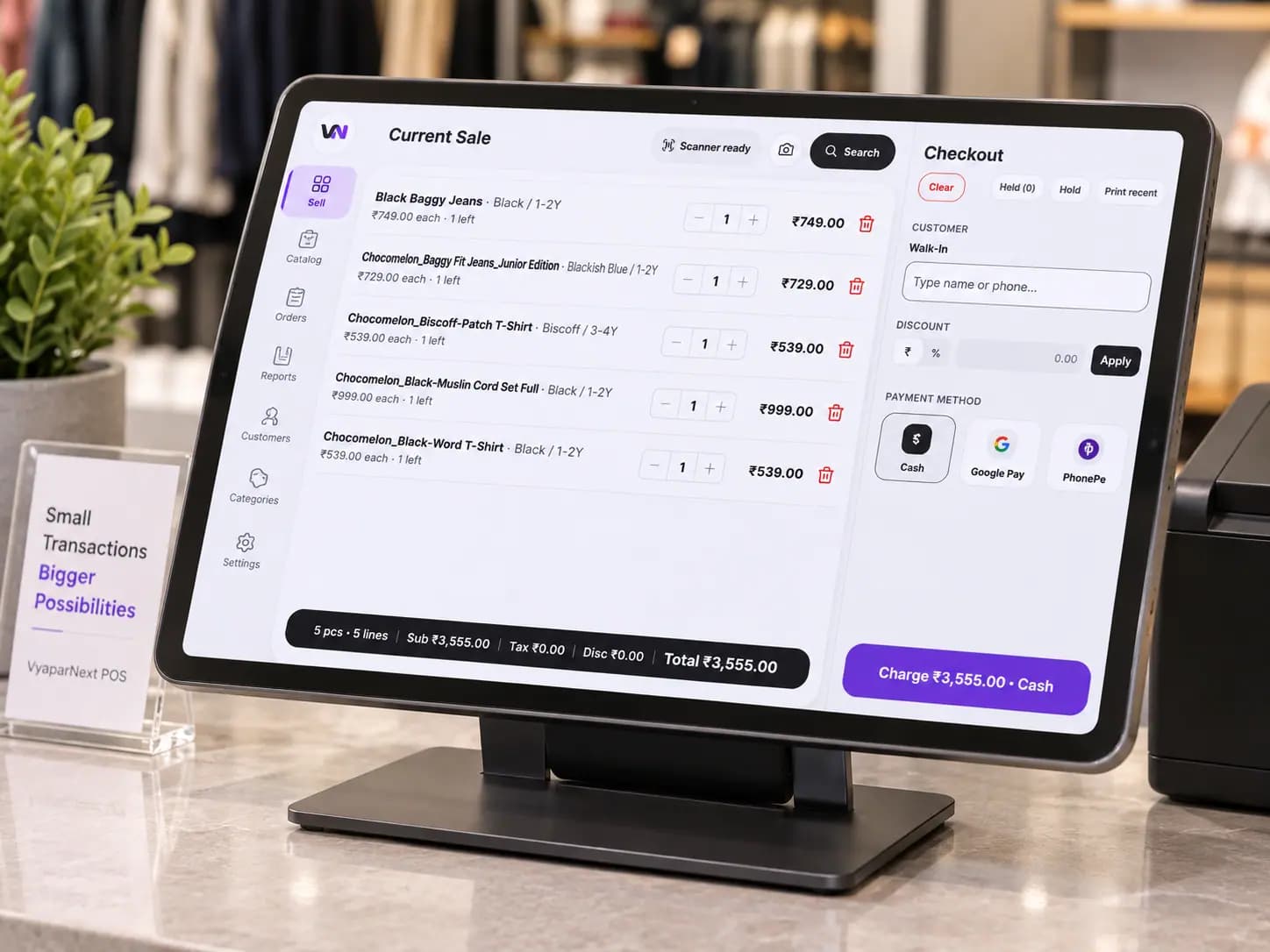 VyaparNext POS tablet on stand with checkout screen