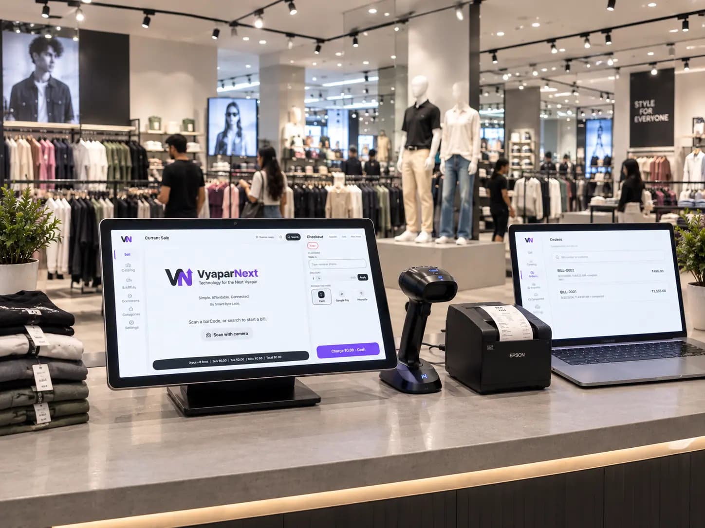 Garment shop billing software on a tablet with barcode scanner at the counter